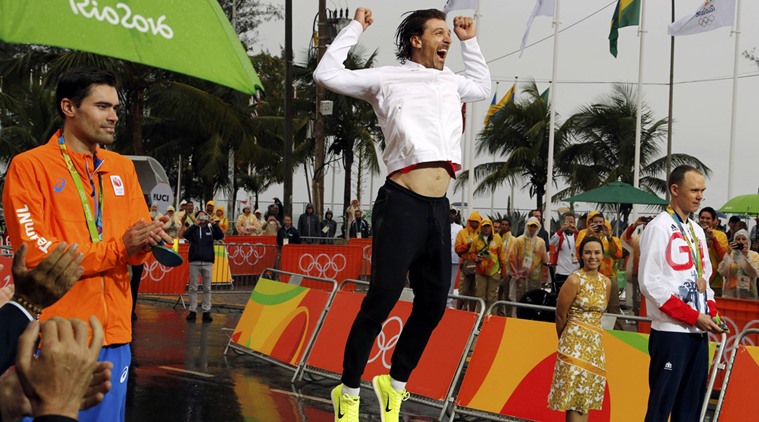 2016 Rio Olympics - Cycling Road - Victory Ceremony - Men's Individual Time Trial Victory Ceremony - Pontal - Rio de Janeiro, Brazil - 10/08/2016. Tom Dumoulin (NED) of Netherlands, Fabian Cancellara (SUI) of Switzerland and Chris Froome (GBR) of United Kingdom on podium. REUTERS/Eric Gaillard FOR EDITORIAL USE ONLY. NOT FOR SALE FOR MARKETING OR ADVERTISING CAMPAIGNS.