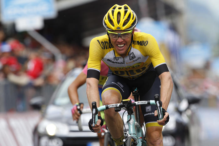 Dutch rider Steven Kruijswijk (Lotto NL- Jumbo) crosses 2nd the finish line of the 16th stage of the 98th Giro d'Italia, Tour of Italy, cycling race between Pinzolo and Aprica on May 26, 2015 in Aprica. Spaniard Alberto Contador took a massive step towards his second Giro d'Italia triumph after increasing his overall lead on Fabio Aru after an epic 16th stage won by fellow Spaniard Mikel Landa today. Landa came over the finish line in 5hr 02min 51sec with Contador settling for third place at 38sec behind on the wheel of Dutchman Steven Kruijswijk. AFP PHOTO / LUK BENIES (Photo credit should read LUK BENIES/AFP/Getty Images)